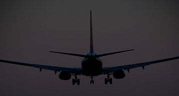 plane landing at night 