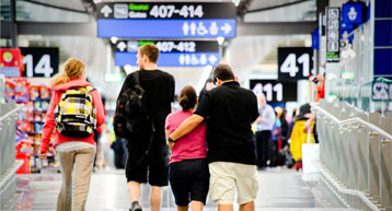 Passengers walking to US preclearance gate