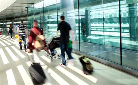 passengers walking on Dublin airport sky bridge